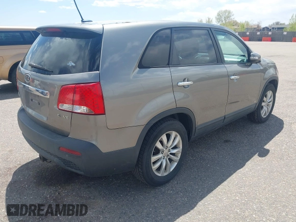 2011 Kia Sorento EX with VIN 5XYKUDA29BG010219, listed as a IAAI auction lot 42106579 with 233,350 mi miles. Bid and sale history available at carsss.com. Image 4.