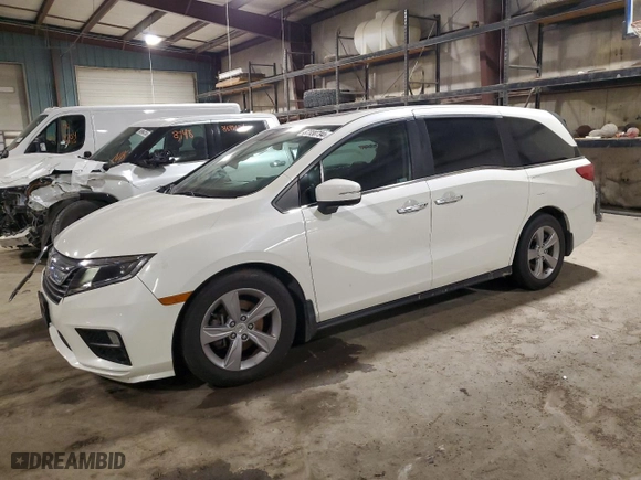 2018 Honda Odyssey EX-L with VIN 5FNRL6H78JB062834, listed as a Copart auction lot 87330794 with 85921 miles and Salvage Title. Bid and sale history available at carsss.com. Image 1.