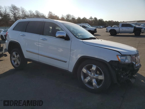 2013 Jeep Grand Cherokee Overland with VIN 1C4RJFCG8DC639408, listed as a Copart auction lot 77910444 with 89,623 mi miles and Salvage Title. Bid and sale history available at carsss.com. Image 4.