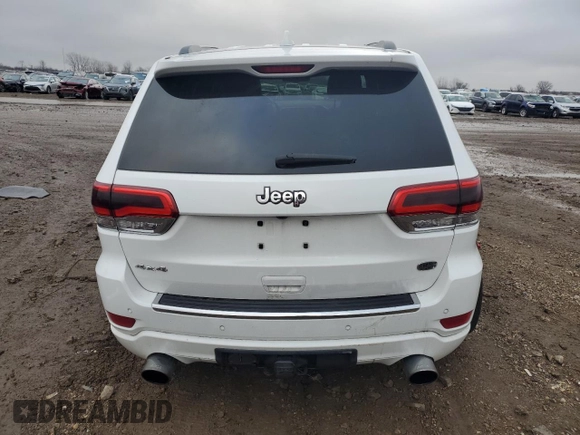 2014 Jeep Grand Cherokee Overland with VIN 1C4RJFCG7EC572298, listed as a Copart auction lot 83970004 with 104,861 mi miles and Salvage Title. Bid and sale history available at DreamBid. Image 6.