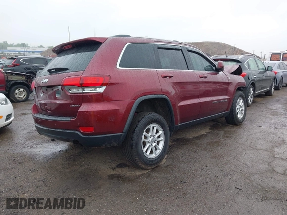 2020 Jeep Grand Cherokee North with VIN 1C4RJFAG1LC211424, listed as a IAAI auction lot 42430446 with 68,910 mi miles and . Bid and sale history available at DreamBid. Image 4.