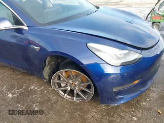 2018 Tesla Model 3 Long Range Battery with VIN 5YJ3E1EB8JF115138, listed as a IAAI auction lot 41343399 with 62,351 mi miles and . Bid and sale history available at DreamBid. Image 6.