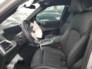 2024 BMW X5 M60i with VIN 5UX33EU07R9T12139, listed as a Copart auction lot 77326454 with 0 mi miles and Salvage Title. Bid and sale history available at carsss.com. Image 7.
