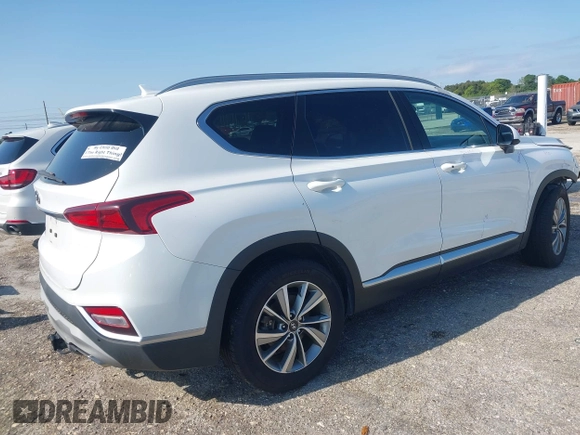 2019 Hyundai Santa Fe SEL with VIN 5NMS33AD6KH081690, listed as a IAAI auction lot 41961423 with 114,389 mi miles and . Bid and sale history available at DreamBid. Image 4.