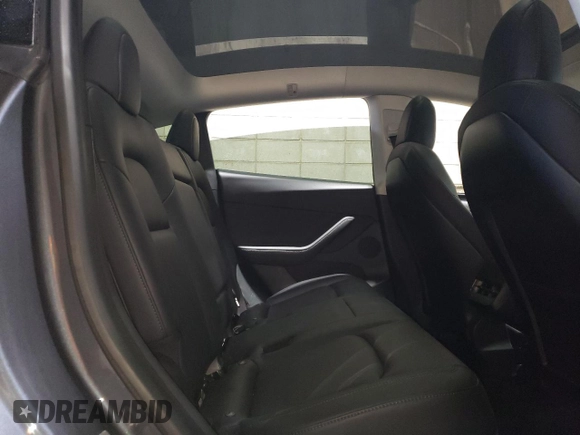 2021 Tesla Model Y Performance with VIN 5YJYGDEF2MF134700, listed as a Copart auction lot 56325685 with 66,730 mi miles and Salvage Title. Bid and sale history available at DreamBid. Image 11.