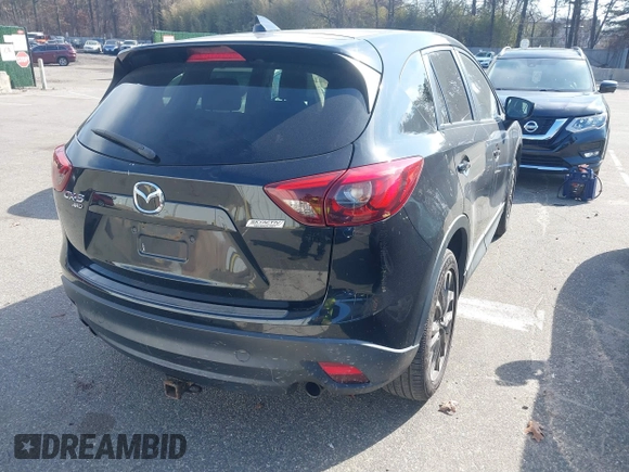 2016 Mazda CX-5 Grand Touring with VIN JM3KE4DY5G0681436, listed as a IAAI auction lot 41664780 with 172,199 mi miles. Bid and sale history available at carsss.com. Image 4.