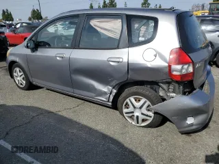 2007 Honda Fit z VIN JHMGD38447S026125, wystawiony jako Copart lot #56554145 z przebiegiem 227 284 mil mil oraz Szkoda całkowita • Salvage title. Historia ofert i sprzedaży dostępna na DreamBid. Obrazek 2.