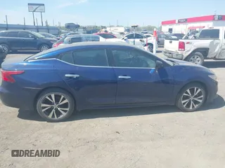 2016 Nissan Maxima SV z VIN 1N4AA6AP3GC386959, wystawiony jako IAAI lot #41886544 z przebiegiem 155 362 mil mil oraz . Historia ofert i sprzedaży dostępna na DreamBid. Obrazek 13.