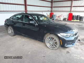 2021 BMW 3 Series 330i xDrive with VIN 3MW5R7J0XM8B58647, listed as a IAAI auction lot 42027965 with 34,230 mi miles. Bid and sale history available at carsss.com. Image 1.