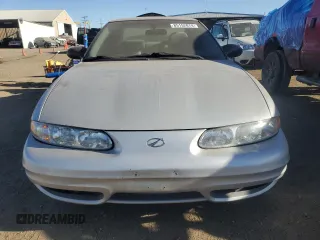 2004 Oldsmobile Alero GL1 z VIN 1G3NL12F94C190244, wystawiony jako Copart lot #85152874 z przebiegiem 134 738 mil mil oraz Szkody całkowita. Historia ofert i sprzedaży dostępna na DreamBid. Obrazek 5.