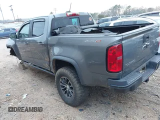 2018 Chevrolet Colorado 4WD ZR2 with VIN 1GCPTEE12J1297871, listed as a IAAI auction lot 41816842 with 101,872 mi miles. Bid and sale history available at carsss.com. Image 3.