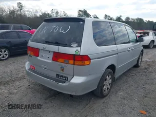 2004 Honda Odyssey EX with VIN 5FNRL18694B118357, listed as a IAAI auction lot 41508682 with 169,017 mi miles and . Bid and sale history available at DreamBid. Image 4.