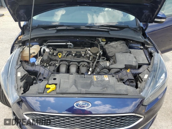 2016 Ford Focus SE z VIN 1FADP3F23GL288232, wystawiony jako Copart lot #62565095 z przebiegiem 11 634 mil mil oraz Szkoda całkowita • Salvage title. Historia ofert i sprzedaży dostępna na DreamBid. Obrazek 11.