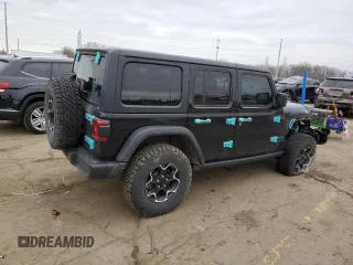 2023 Jeep Wrangler Rubicon z VIN 1C4JJXR63PW566503, wystawiony jako Copart lot #49884605 z przebiegiem 19 304 mil mil oraz Szkoda całkowita • Salvage title. Historia ofert i sprzedaży dostępna na DreamBid. Obrazek 3.