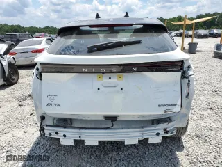 2023 Nissan ARIYA PREMIERE with VIN JN1BF0BAXPM411103, listed as a Copart auction lot 57527704 with 10,326 mi miles and Salvage Title. Bid and sale history available at carsss.com. Image 6.