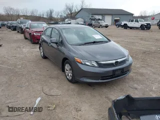 2012 Honda Civic Sdn LX with VIN 19XFB2F5XCE075657, listed as a IAAI auction lot 41911711 with 180,964 mi miles. Bid and sale history available at carsss.com. Image 1.
