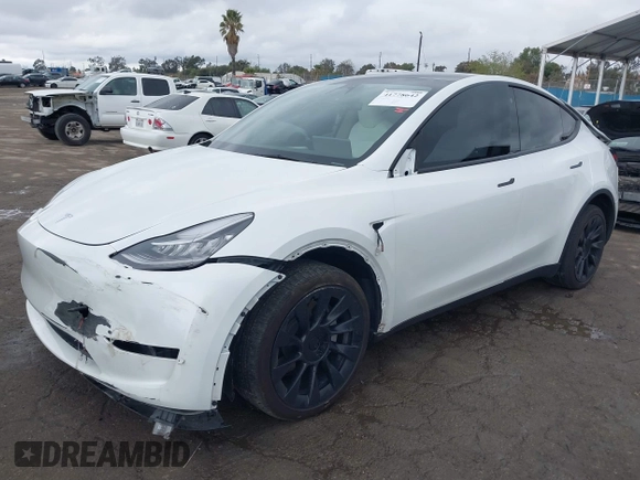 2023 Tesla Model Y Long Range with VIN 7SAYGDEE1PA106057, listed as a IAAI auction lot 41778642 with 1 mi miles. Bid and sale history available at carsss.com. Image 20.