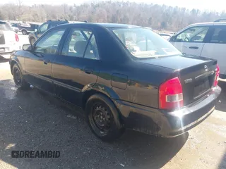2000 Mazda Protege DX with VIN JM1BJ2227Y0303448, listed as a IAAI auction lot 41482747 with 206,542 mi miles and . Bid and sale history available at DreamBid. Image 3.
