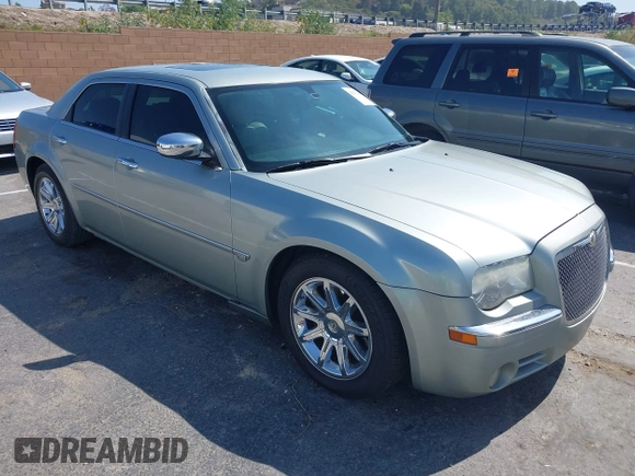 2006 Chrysler 300 C with VIN 2C3LA63H26H130160, listed as a IAAI auction lot 42170192 with 124,206 mi miles. Bid and sale history available at carsss.com. Image 1.