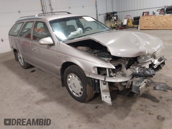 1994 Mercury Sable z VIN 1MELM5848RG607787, wystawiony jako IAAI lot #41938845 z przebiegiem 135 611 mil mil oraz . Historia ofert i sprzedaży dostępna na DreamBid. Obrazek 1.