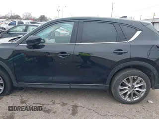 2020 Mazda CX-5 Grand Touring with VIN JM3KFADM8L0811910, listed as a IAAI auction lot 41446214 with 57,849 mi miles. Bid and sale history available at carsss.com. Image 15.