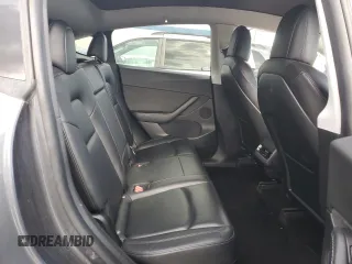 2021 Tesla Model Y Long Range with VIN 5YJYGDEE6MF200883, listed as a Copart auction lot 51707405 with 59,820 mi miles and Salvage Title. Bid and sale history available at DreamBid. Image 10.