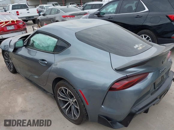 2021 Toyota Supra 2.0 with VIN WZ1DB2C0XMW038679, listed as a IAAI auction lot 42407988 with 76,316 mi miles and . Bid and sale history available at DreamBid. Image 3.