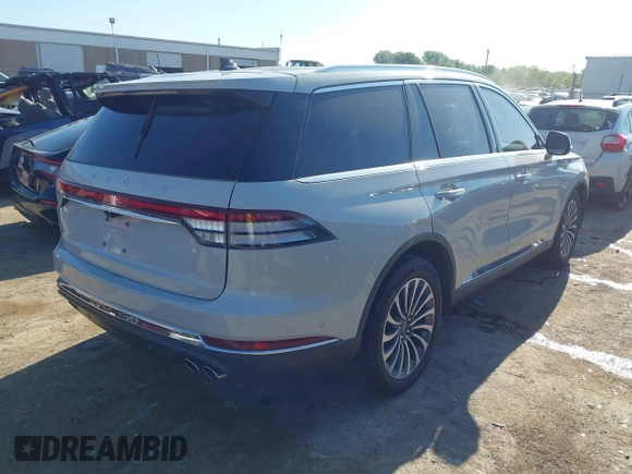 2021 Lincoln Aviator Reserve z VIN 5LM5J7WC6MGL12195, wystawiony jako IAAI lot #42159567 z przebiegiem 95 199 mil mil oraz . Historia ofert i sprzedaży dostępna na DreamBid. Obrazek 4.