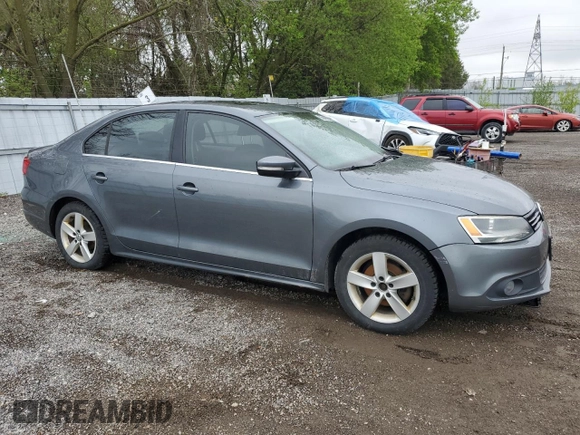 2014 Volkswagen Jetta Comfortline with VIN 3VWDL7AJ2EM399732, listed as a Copart auction lot 55946795 with 198,723 mi miles and Clean title. Bid and sale history available at DreamBid. Image 4.
