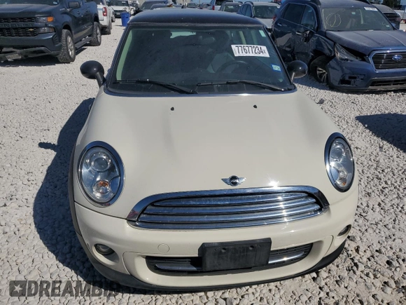 2013 MINI Hardtop with VIN WMWSU3C56DT682857, listed as a Copart auction lot 77677234 with 92,625 mi miles and Clean Title. Bid and sale history available at DreamBid. Image 5.