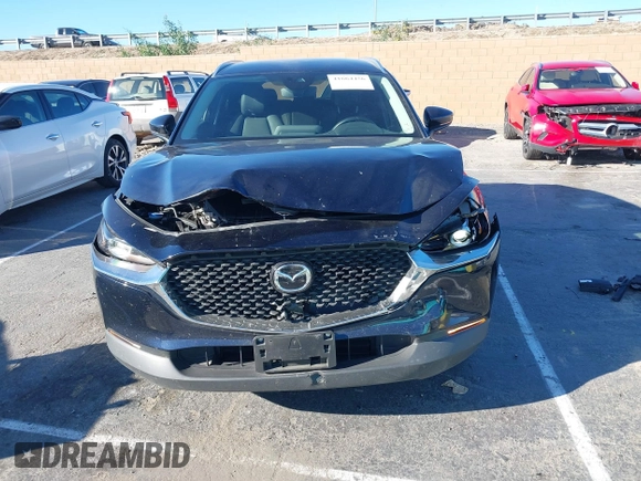 2023 Mazda CX-30 S Select with VIN 3MVDMBBM8PM514475, listed as a IAAI auction lot 41664456 with 33,076 mi miles and . Bid and sale history available at DreamBid. Image 12.