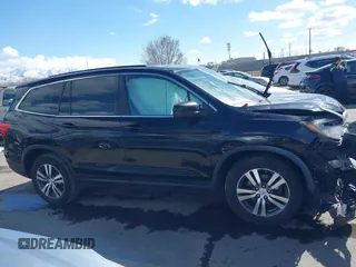 2016 Honda Pilot EX-L with VIN 5FNYF6H53GB048317, listed as a IAAI auction lot 41826297 with 127,672 mi miles. Bid and sale history available at carsss.com. Image 13.