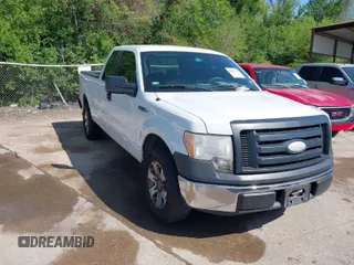 2009 Ford F-150 STX with VIN 1FTRX12W89KC52056, listed as a IAAI auction lot 41982659 with 318,539 mi miles. Bid and sale history available at carsss.com. Image 1.