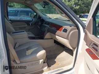 2013 Chevrolet Tahoe LTZ with VIN 1GNSKCE07DR326996, listed as a IAAI auction lot 42203073 with 147,067 mi miles and . Bid and sale history available at DreamBid. Image 5.