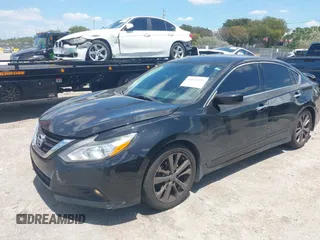 2018 Nissan Altima SV with VIN 1N4AL3AP8JC259494, listed as a IAAI auction lot 42041433 with 150,970 mi miles and . Bid and sale history available at DreamBid. Image 2.