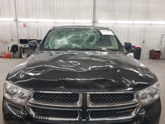 2013 Dodge Durango SXT with VIN 1C4RDJAG0DC512293, listed as a IAAI auction lot 41875919 with 191,128 mi miles and . Bid and sale history available at DreamBid. Image 6.