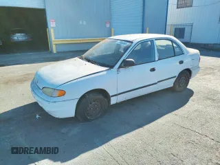1997 Hyundai Accent z VIN KMHVF24NXVU373676, wystawiony jako Copart lot #77866484 z przebiegiem 151 949 mil mil oraz Tytuł czysty. Historia ofert i sprzedaży dostępna na DreamBid. Obrazek 1.