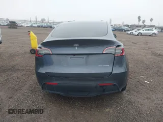 2023 Tesla Model Y Long Range with VIN 7SAYGDEE7PF894362, listed as a IAAI auction lot 41512492 with 27,513 mi miles. Bid and sale history available at carsss.com. Image 15.