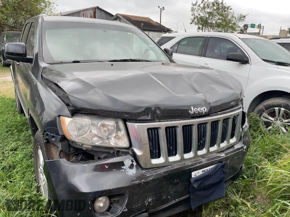 2012 Jeep Grand Cherokee Laredo with VIN 1C4RJEAG8CC119401, listed as a IAAI auction lot 41724335 with 233,265 mi miles. Bid and sale history available at carsss.com. Image 6.