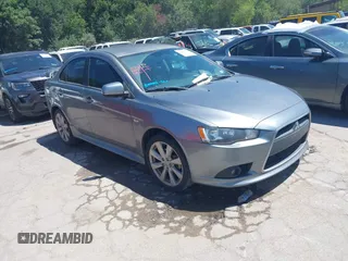 2013 Mitsubishi Lancer GT with VIN JA32U8FW7DU015180, listed as a IAAI auction lot 42607077 with 105,677 mi miles and . Bid and sale history available at DreamBid. Image 1.