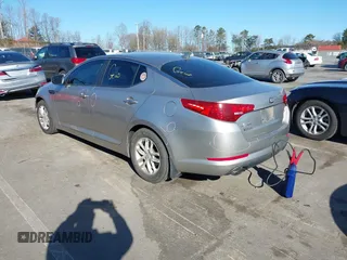 2013 Kia Optima LX with VIN KNAGM4A74D5362733, listed as a IAAI auction lot 41822608 with 134,075 mi miles. Bid and sale history available at carsss.com. Image 3.