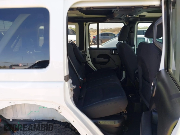 2023 Jeep Wrangler Rubicon with VIN 1C4JJXR63PW580370, listed as a IAAI auction lot 42017282 with 31,823 mi miles and . Bid and sale history available at DreamBid. Image 8.