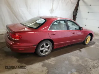 2001 Mazda Millenia S z VIN JM1TA222111707236, wystawiony jako Copart lot #54690874 z przebiegiem 107 530 mil mil oraz Szkody całkowita. Historia ofert i sprzedaży dostępna na DreamBid. Obrazek 3.