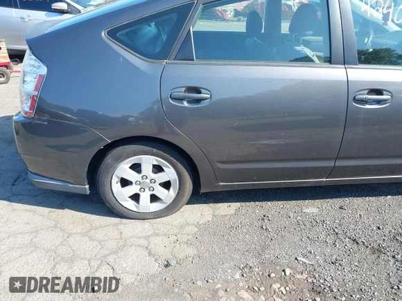 2007 Toyota Prius z VIN JTDKB20U473225645, wystawiony jako IAAI lot #42409516 z przebiegiem 154 050 mil mil oraz . Historia ofert i sprzedaży dostępna na DreamBid. Obrazek 13.