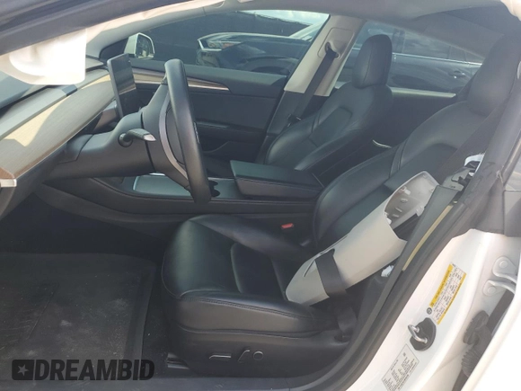2021 Tesla Model 3 Standard Range Plus z VIN 5YJ3E1EA1MF064335, wystawiony jako Copart lot #57133955 z przebiegiem 60 024 mil mil oraz Szkody całkowita. Historia ofert i sprzedaży dostępna na DreamBid. Obrazek 7.