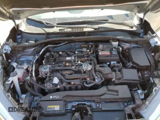 2023 Toyota Corolla Cross XLE z VIN 7MUDAAAG0PV063242, wystawiony jako Copart lot #52511585 z przebiegiem 10 695 mil mil oraz Szkody całkowita. Historia ofert i sprzedaży dostępna na DreamBid. Obrazek 13.