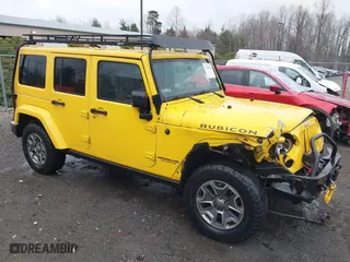 2015 Jeep Wrangler Unlimited Rubicon Hard Rock with VIN 1C4HJWFG8FL548004, listed as a IAAI auction lot 41719194 with 89,834 mi miles. Bid and sale history available at carsss.com. Image 1.