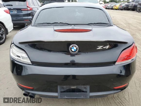 2012 BMW Z4 sDrive28i with VIN WBALL5C56CE716558, listed as a Copart auction lot 62003125 with 93,438 mi miles and Salvage title. Bid and sale history available at DreamBid. Image 6.