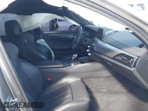 2020 BMW M5 Competition z VIN WBSJF0C05LB448878, wystawiony jako IAAI lot #41796245 z przebiegiem 62 856 mil mil oraz . Historia ofert i sprzedaży dostępna na DreamBid. Obrazek 5.