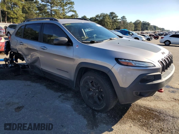 2017 Jeep Cherokee Trailhawk L Plus with VIN 1C4PJMBS7HD220533, listed as a Copart auction lot 81403364 with 94,101 mi miles and Salvage Title. Bid and sale history available at carsss.com. Image 4.